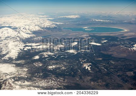 flying over california mountains in the spring