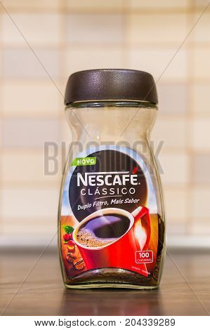 Portuguese Nescafe Classic In A Opened Glass Jar On A Wooden Table In Soft Focus On August 2017 In P