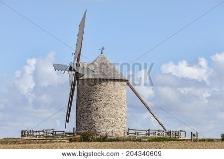 Traditional windmill in the vicinity of Mont Saint Michel monastery in Base Normandy in France.This is 
