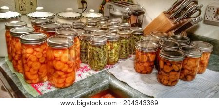 Home canning and preserving, canned vegetables, canned carrots and green beans