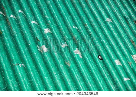 pollution source , wavy roof cover on pollutant eternit panels .