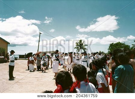 NUKU'ALOFA, TONGATAPU / TONGA - CIRCA 1990: A military band marches in a parade during a national holiday.
