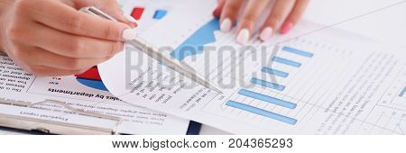 Businesswoman Holding A Silver Pen In Her Hand