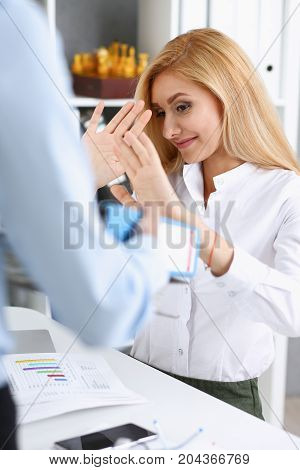 Female Employee Show Pack Of Documents To Manager