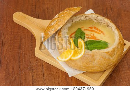 Soup In A Bread Bowl On The Board