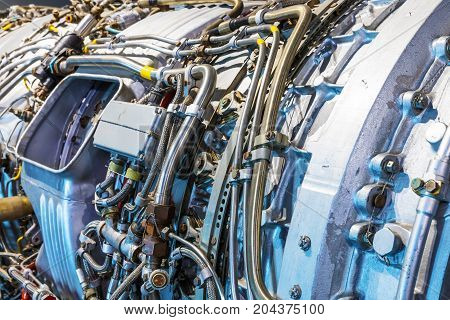 Macro view of the airliner turbojet turbine engine equipment with selective focus effect