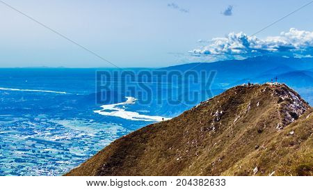 On The Summit Of An Alpine Peak