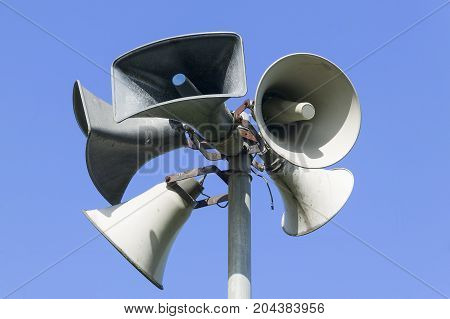 Public address system consisting of five megaphones