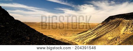 Mountain landscape in Black Desert near Bahariya oasis Egypt