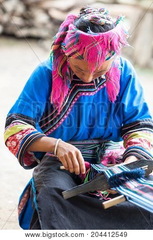 Phongsali Laos - July 25 2010: Hilltribe woman of ethnic group 