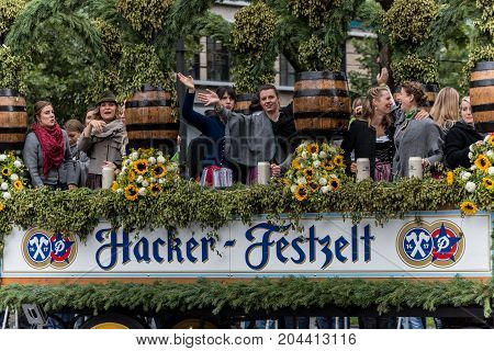 MUNICH GERMANY - 16 OCTOBER 2017: Tent owners and breweries parade at the beginning of Oktoberfest - Hacker Pschorr parade