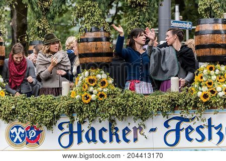 MUNICH GERMANY - 16 OCTOBER 2017: Tent owners and breweries parade at the beginning of Oktoberfest - Hacker Pschorr parade