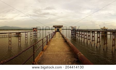 The long bridge on reservoir Chonburi Thailand.