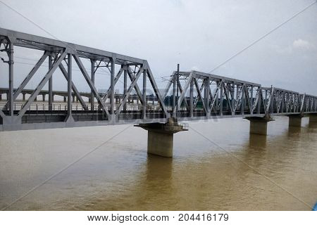 A big railway bridge.
Makes by human.
This bridge is in Mahanadi river in odisa.