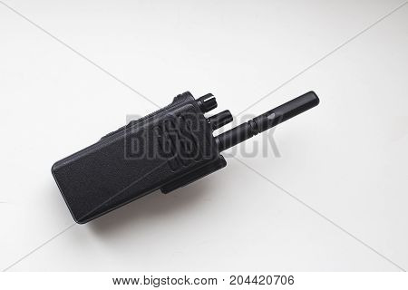 Portable radio transceiver walkie-talkie on white table