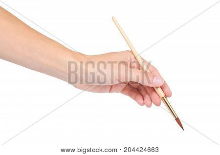Paint Brush In Hand Isolated On White Background