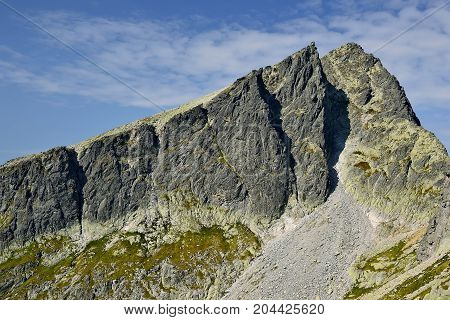 High Tatras in Slovakia. Monumental peaks. Summer scenic landscape mountain view. Alpine trail. Javorovy peak in Big cold valley.
