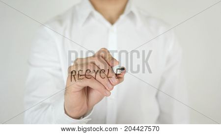 Recycle, Written On Glass By Man In Studio