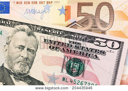 Close up of dollar and euro banknotes. High resolution photo.