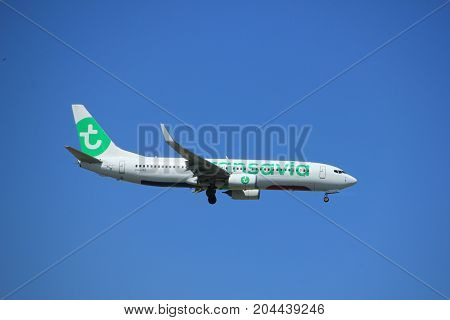 Amsterdam the Netherlands - July 9th 2017: PH-HXB Transavia Boeing 737-800 approaching Schiphol Amsterdam Airport Kaagbaan runway