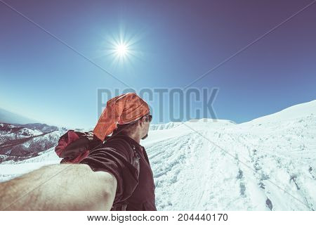 Adult Alpin Skier With Beard, Sunglasses And Hat, Taking Selfie On Snowy Slope In The Beautiful Ital