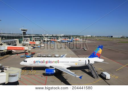 Amsterdam The Netherlands - May 26th 2017: D-ABDB Small Planet Airlines Germany Airbus A320 at the gate at Schiphol International Airport