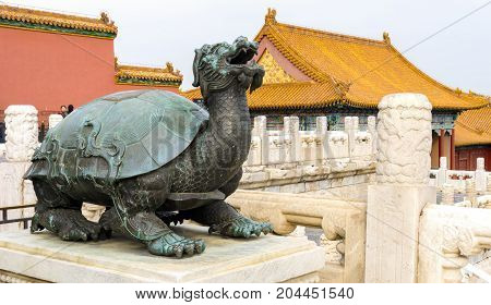 Beijing, China - Oct 30, 2016: Copper tortoise, one of a pair, at the Hall of Supreme Harmony (Taihedian). Forbidden City (Gu Gong, Palace Museum).