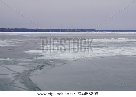 A view of ice-covered Little Traverse Bay, from the beach in Wequetonsing, Michigan, during March.