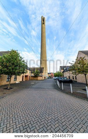 Northampton, UK - Sep 10, 2017: Northampton National lift tower over morning cityscape.