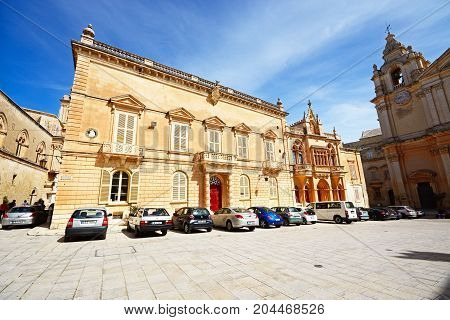 MDINA, MALTA - APRIL 1, 2017 - The Bishops Palace and part of the Cathedral in the Pjazza San Pawl Mdina Malta Europe, April 1, 2017.
