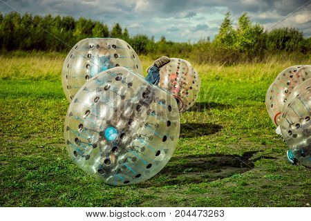 Bumperball. Teens Play Bumper-ball Outdoor