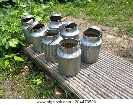 Old empty aliminium cans for water supplies in hot weather