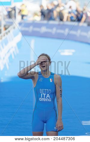 STOCKHOLM - AUG 26 2017: Female triathlete Alice Betto exhausted after the finish in the Women's ITU World Triathlon series event August 26 2017 in Stockholm Sweden