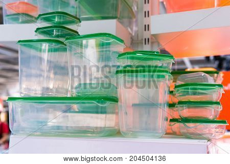 Green plastic boxes of various sizes sold in cookware stores. Plastic can be used to store different types of food as well. Suitable for women who love to organize the kitchen.