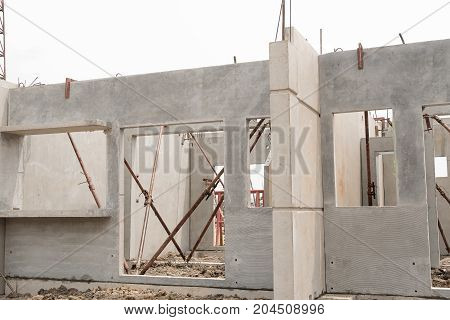 Installation of prefabricated building wall panels in construction works.