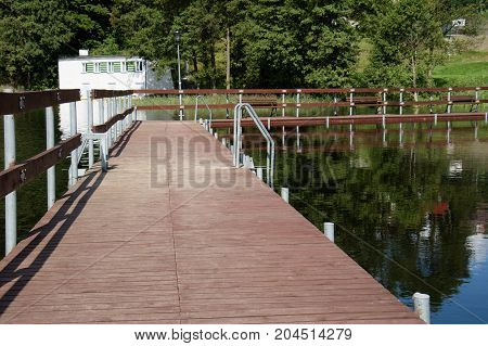 Bridge Over The Lake, River. Beautiful Autumn Season.