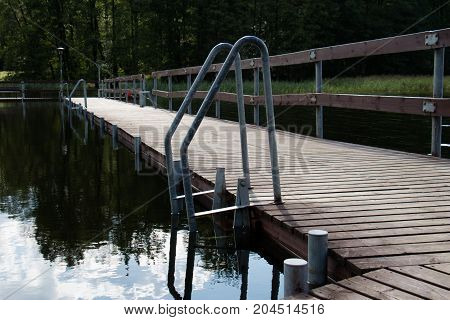 Bridge over the lake, river. Beautiful autumn season. September season.