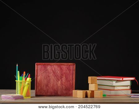 Back to school and education banner with colorful pencils and stationery.