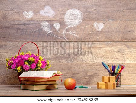 Back to school concepty with clear blackboard background, desk, items