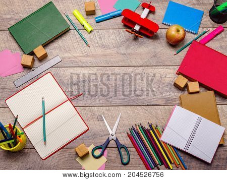 Back to school concepty with clear blackboard background, desk, items
