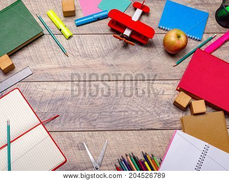 Back to school concepty with clear blackboard background, desk, items