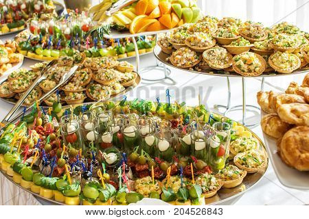 Delicacies and snacks at a buffet or Banquet. Catering. Selective focus.
