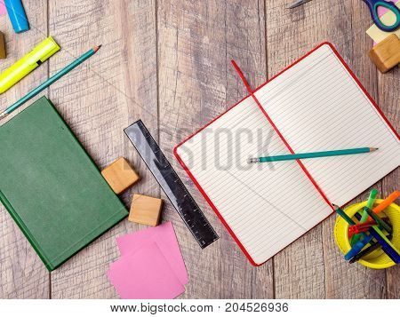 Back to school concepty with clear blackboard background, desk, items