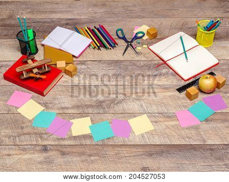 Back to school concepty with clear blackboard background, desk, items