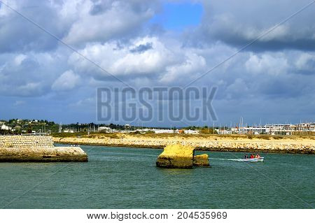 Lagos Algarve Portugal - October 28 2015 : Motorboat on the Bensafrim river in Lagos harbour