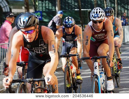 STOCKHOLM - AUG 26 2017: Closeup of fighting cycling triathletes in the Men's ITU World Triathlon series event August 26 2017 in Stockholm Sweden