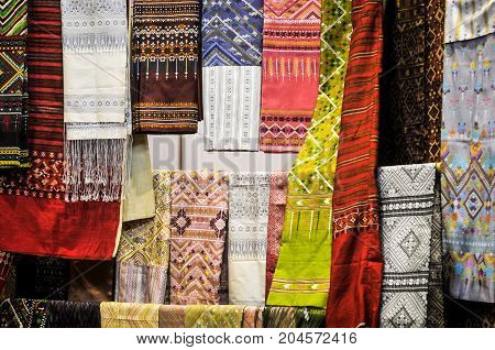Thai silk background, A traditional hand-weaving loom being used to make Thai silk cloth, Thailand Household handicrafts of Thai silk