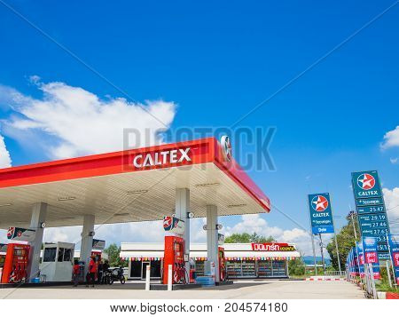 Trang Thailand - September 2 2017: Caltex gas station blue sky background. Caltex is a petroleum brand name of Chevron Corporation used in more than 60 countries.