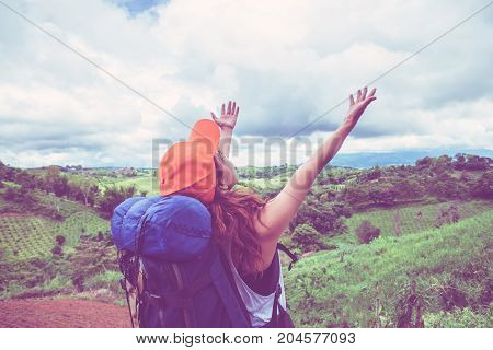 Asian women travel relax in the holiday. Standing on the mountain. Thailand