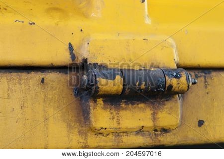 The truck hinges on the side of the car.